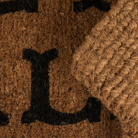 Creative Co-Op Hey Y'all Doormat outdoor-ready on covered porch
