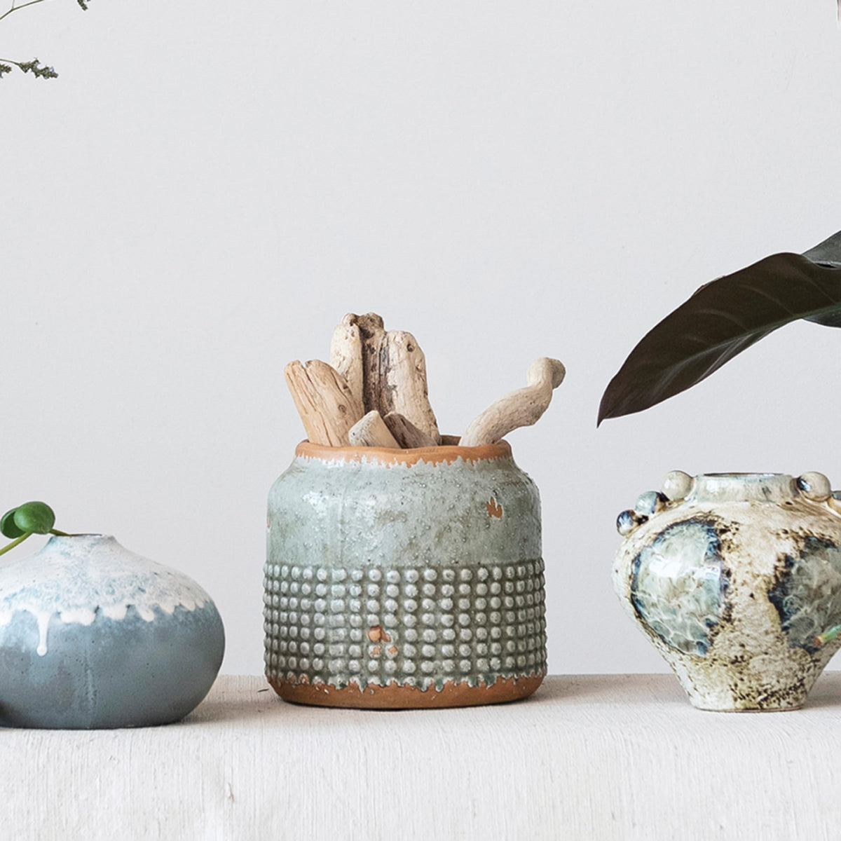 Creative Co-Op planter with dried botanicals showing versatile display options.