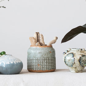Creative Co-Op planter with dried botanicals showing versatile display options.