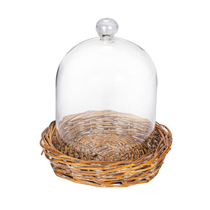 Creative Co-Op round glass cloche with willow base protects prized items from dust.