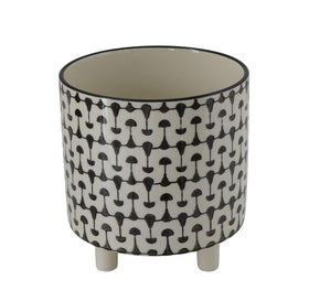 Creative Co-Op round stoneware planter with geometric pattern for medium plants on shelves.