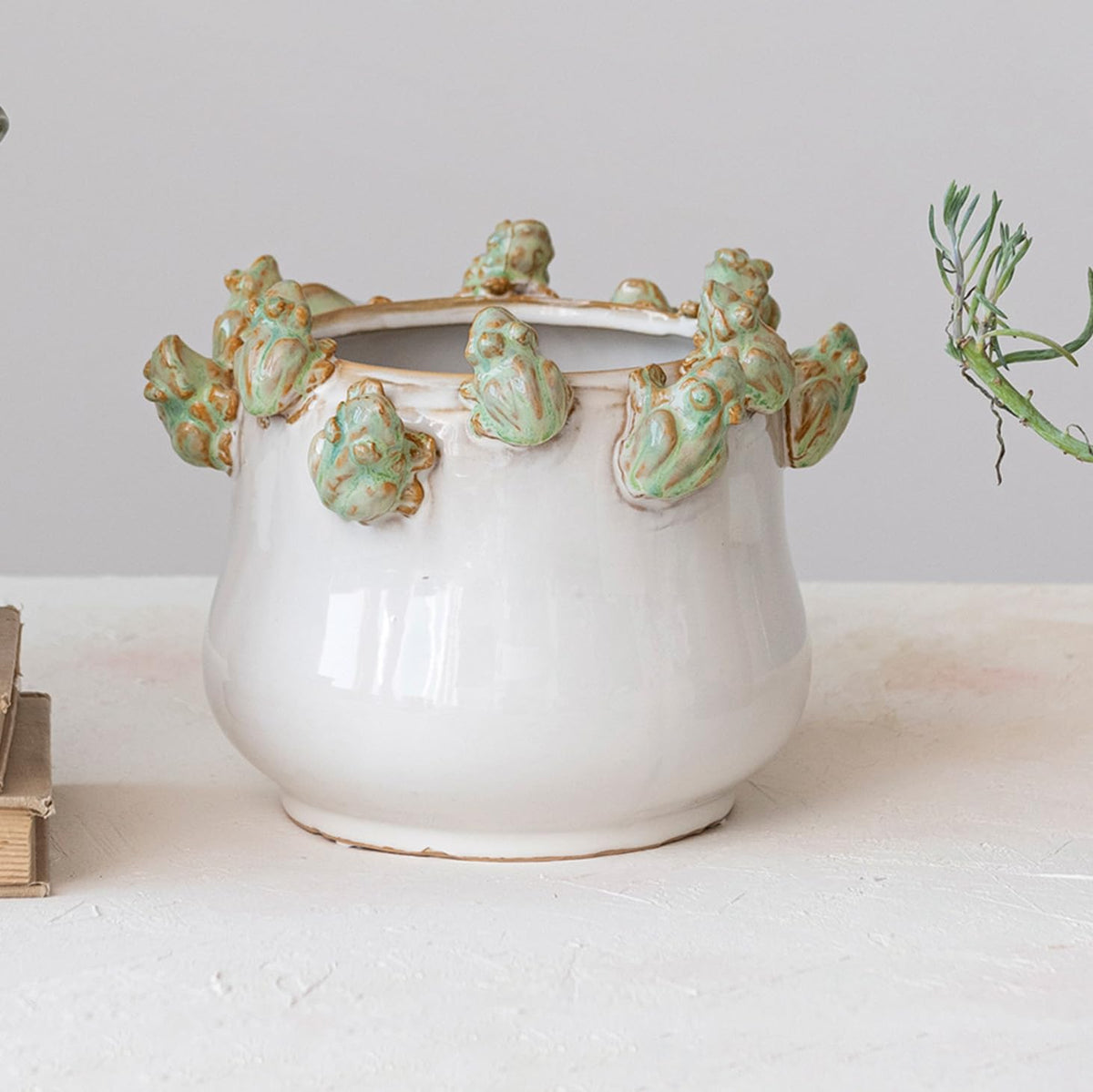 Creative Co-Op stoneware planter in green and white glaze brightens a kitchen or desk