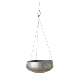 Creative Co-Op textured silver finish metal planter highlights industrial style for patios.