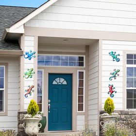 Indoor living room display of metal geckos adds artful charm