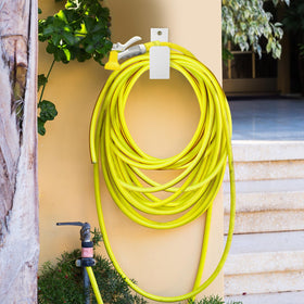 CroBlissful modern white outdoor hose holder enhances curb appeal.