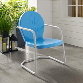 Crosley Griffith cantilever base provides slight flex for outdoor comfort.