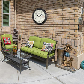 Crosstime bronze finish outdoor clock complements exterior decor.