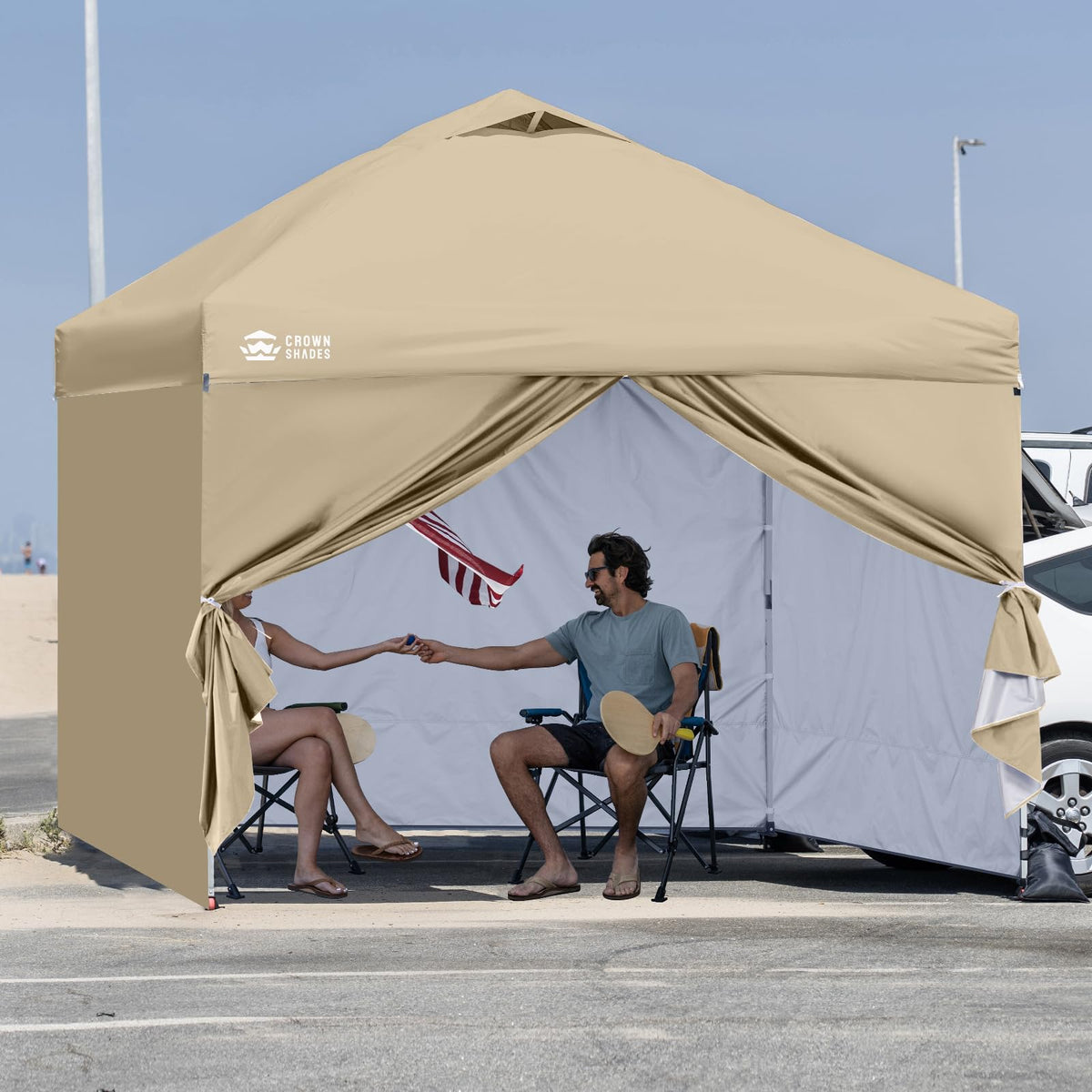 Crown Shades sidewall beige fit-10x10 pop-up demonstrates versatile canopy extension
