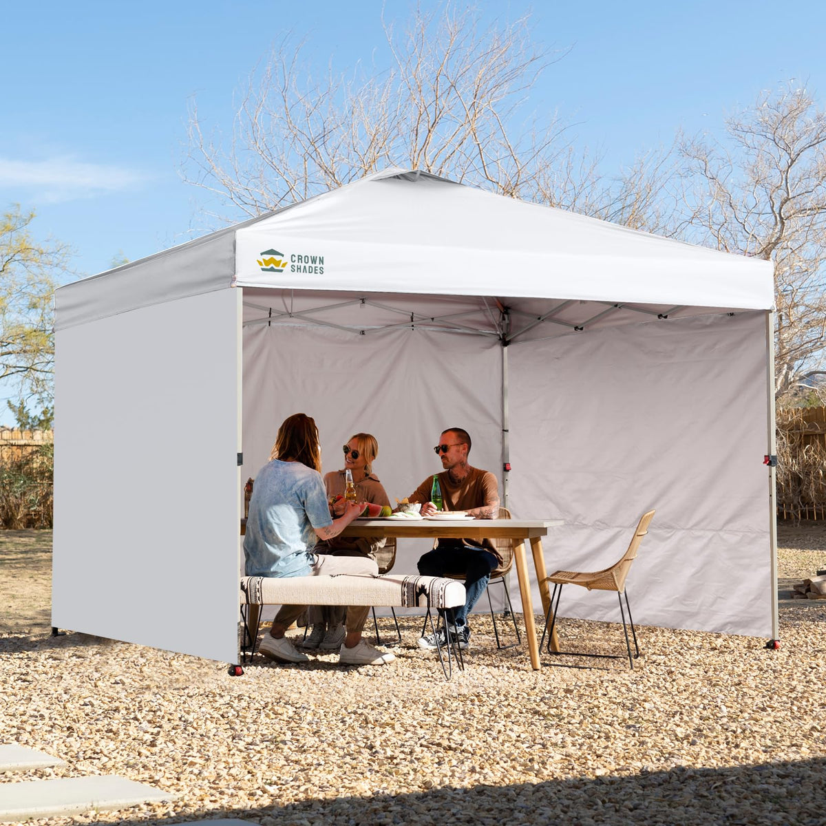 CROWN SHADES silver-coated polyester fabric offers sturdy, weather-ready performance.