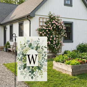 CROWNED BEAUTY double-sided W monogram flag visible from all angles.