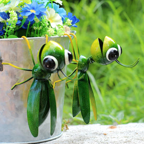 Close-up of painted metal grasshopper details from Cruis Cuka collection.