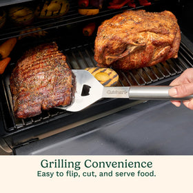 Cuisinart corn holders securing corn for even roasting.
