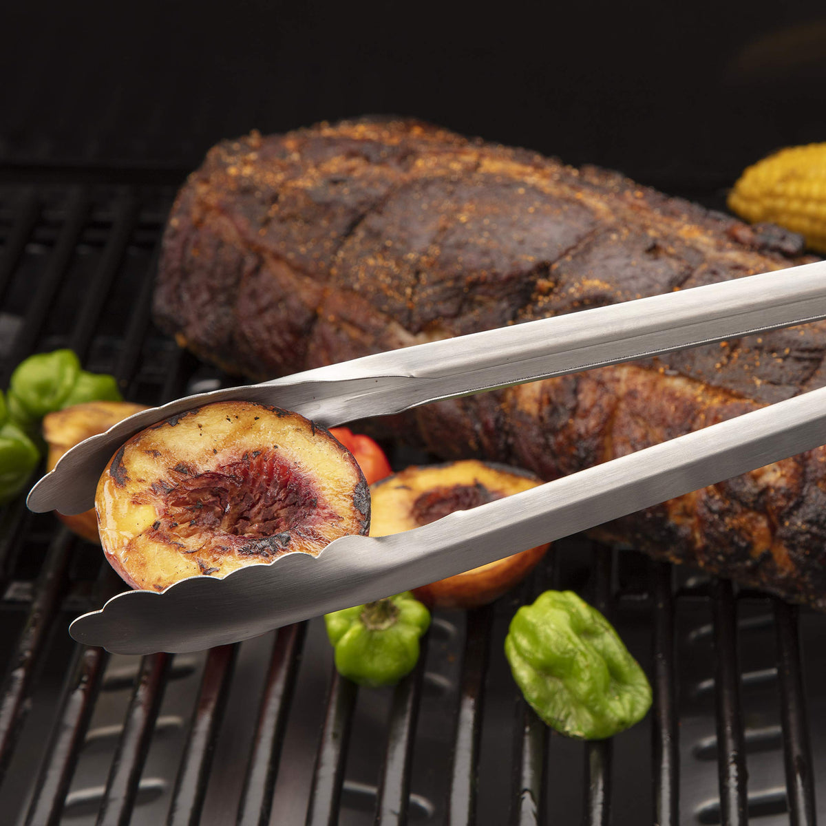 Cuisinart locking grill tongs with hanging loop for easy storage after grilling.