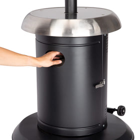 Cuisinart outdoor heater in action near seating and dining area.