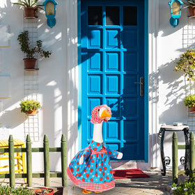 Cutecrop strawberry goose outfit with daisy pattern brightens outdoor spaces.