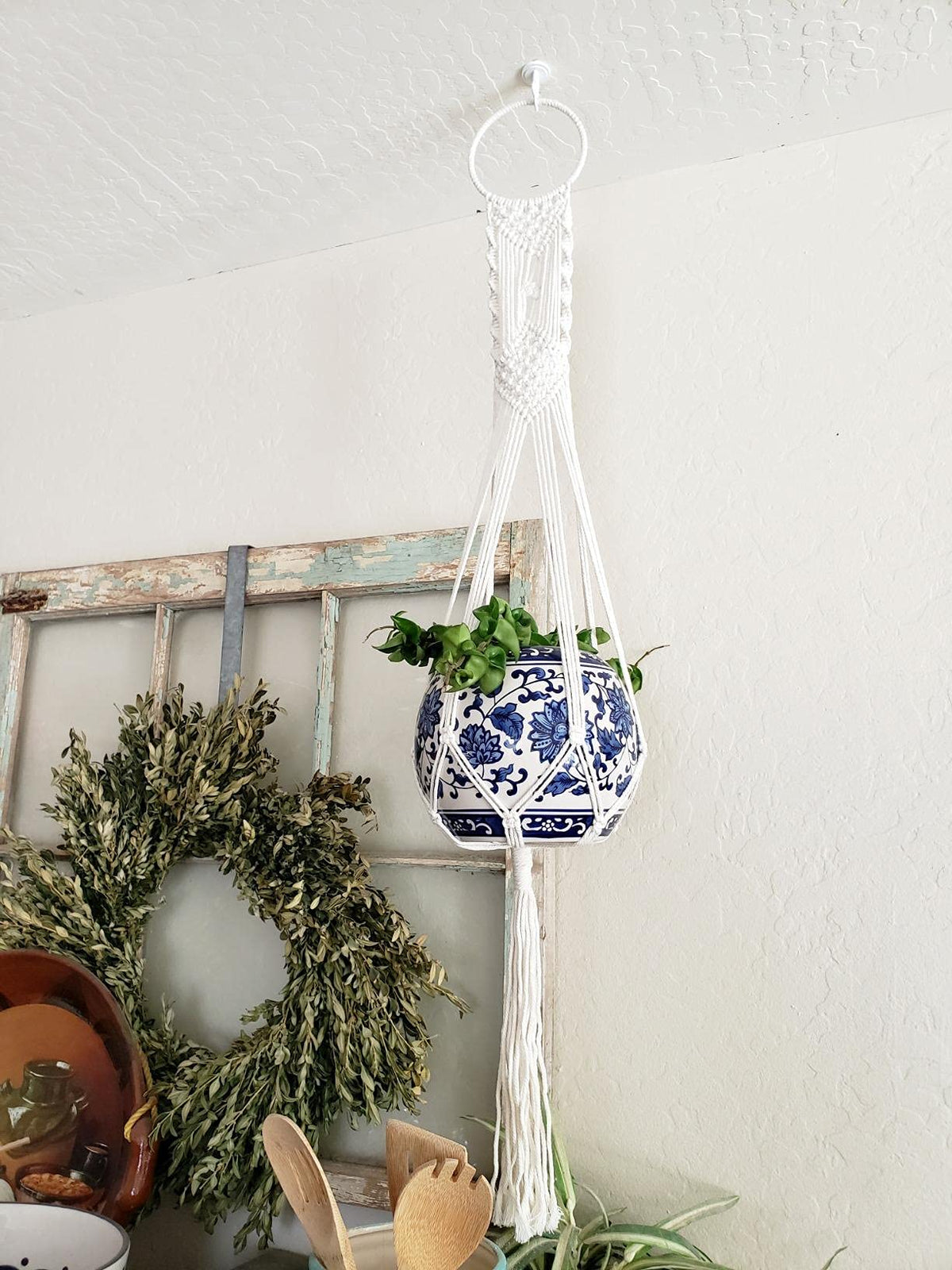 Cuttte Macrame Plant Hanger in cream complements boho interiors.