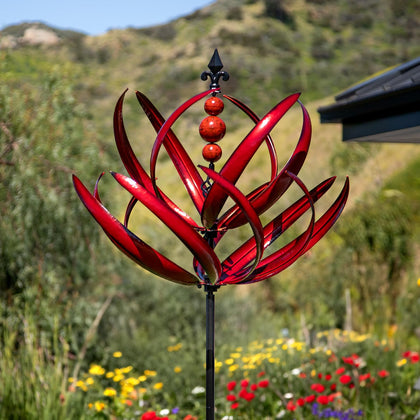 Cyan Oasis Burgundy Lotus wind spinner assembly adds vibrant motion to outdoor spaces