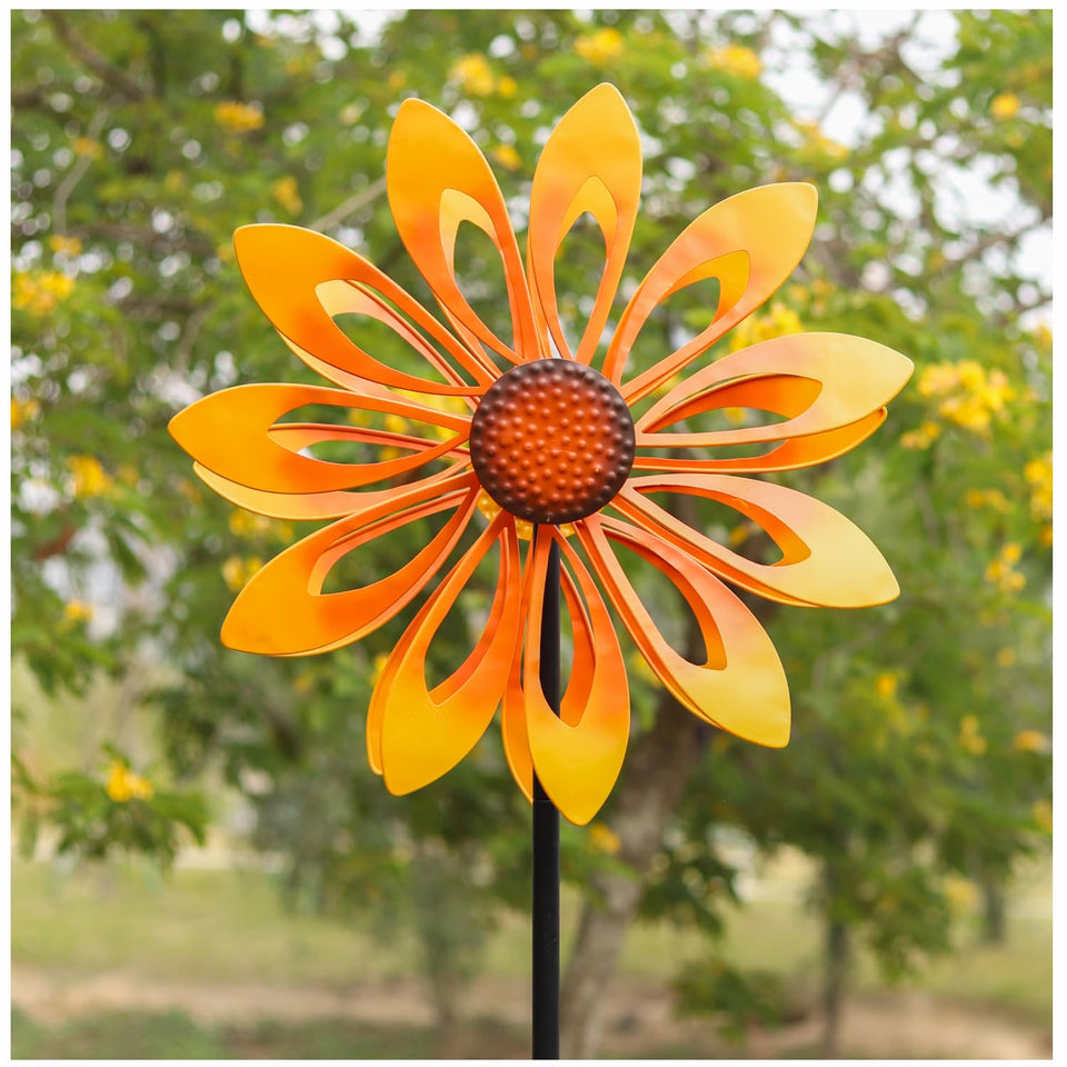 Cyan Oasis sunflower wind spinner front view in a bright garden