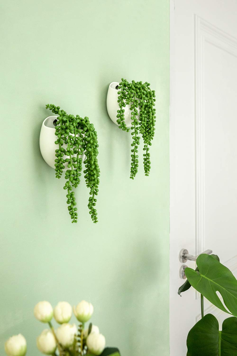 Dahey ceramic pot with mounting kit for easy wall display.