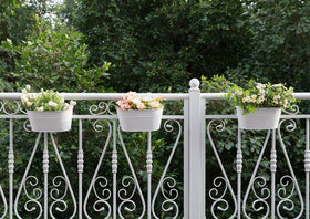 Dahey planters with drainage holes promote healthy water flow.