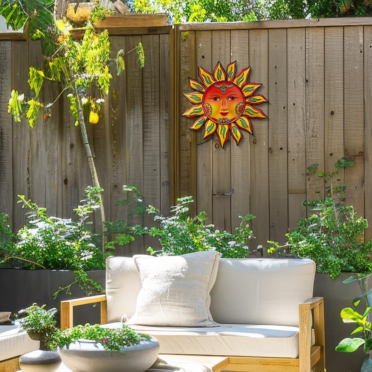 Daogtc sun wall decor in a garden setting adds warmth outside.
