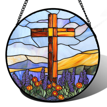 DASTOLL cross stained-glass suncatcher in a window casting warm colors for ambiance.