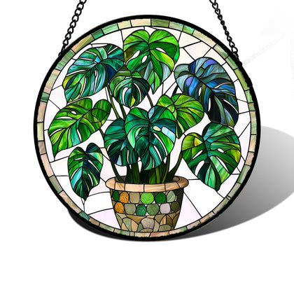 DASTOLL green Monstera suncatcher in a diamond glass panel brightens windows with vibrant color.