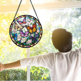 DASTOLL butterfly suncatcher above doorway creates playful light patterns