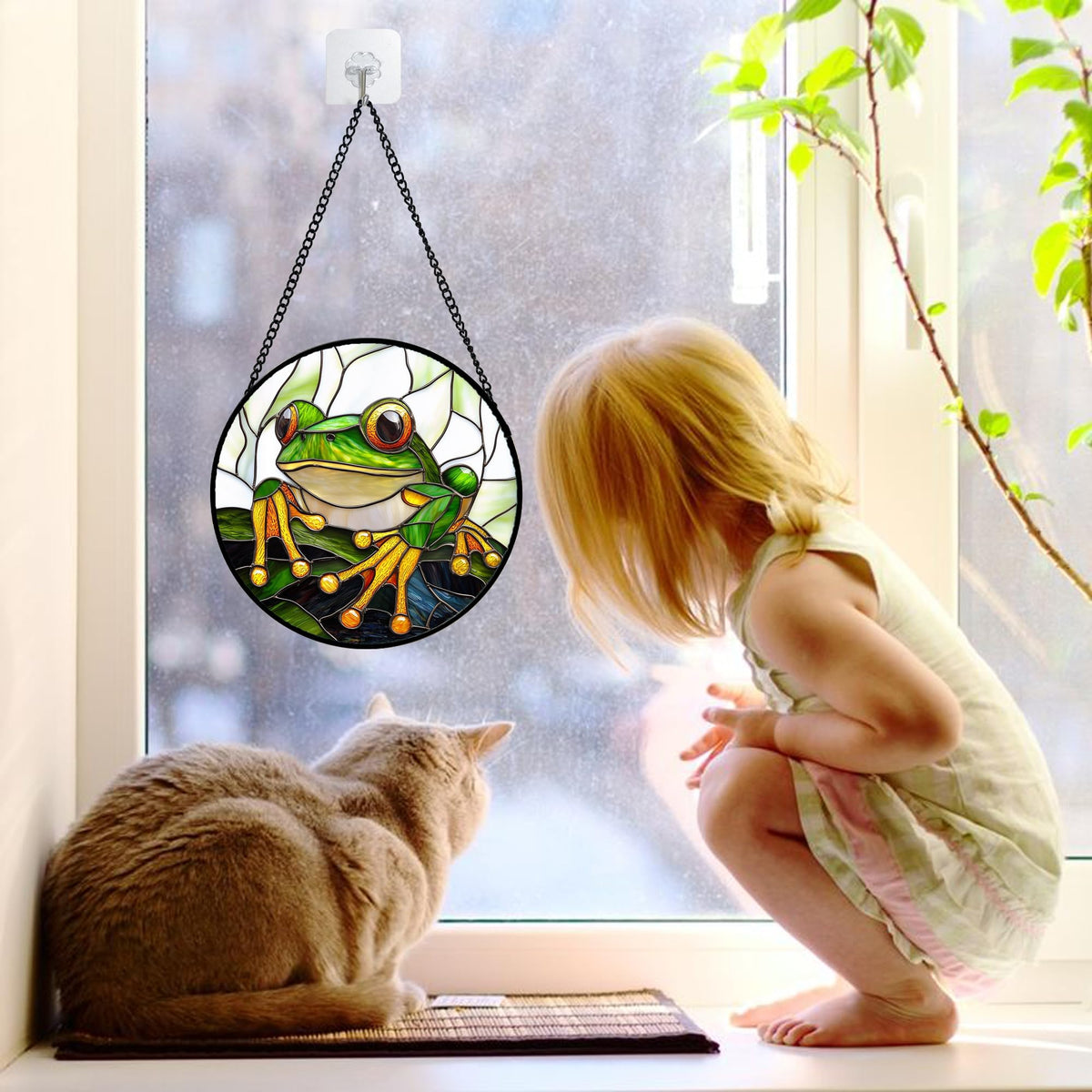 DASTOLL sun catcher shows green frog flowers catching sunlight for a vibrant accent.