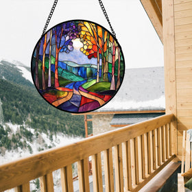 DASTOLL suncatcher on a branch adds warm ambience to a window