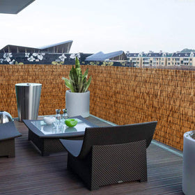 DearHouse reed fence roll for shade and light filtering on patios.