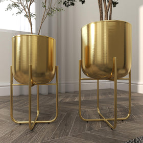 Outdoor patio setup featuring Deco 79 gold planters.