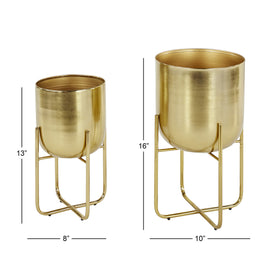 Deco 79 brushed gold small planter with curved X base, perfect for shelves.