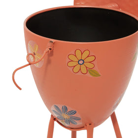 Deco 79 metal planter for indoor and outdoor display delivers durable versatility.