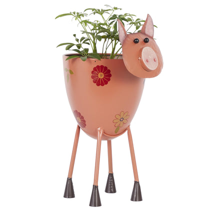 Deco 79 pink pig planter with floral pattern adds whimsical charm to indoor spaces.