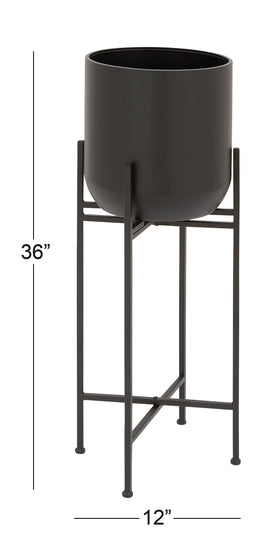 Deco 79 black metal planter has no drainage holes and is not watertight.