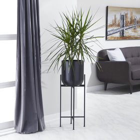 Deco 79 tall 36-inch black planter ideal for entryways.