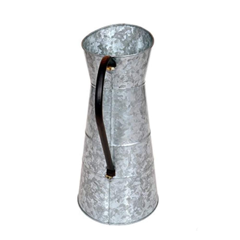 Deco 79 watering jug gray used as vase for florals.