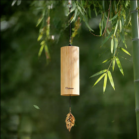 DELOVEWO wind chimes outdoors with natural bamboo for a peaceful garden ambience