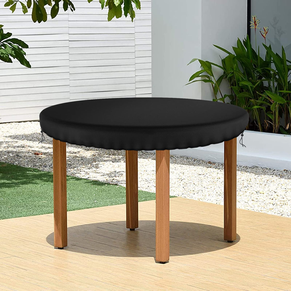 Demao black patio cover complements any patio setup while guarding surfaces.