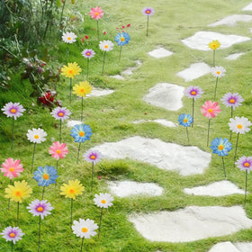 Demonwer Daisy Garden Stakes on an outdoor border for patio appeal.