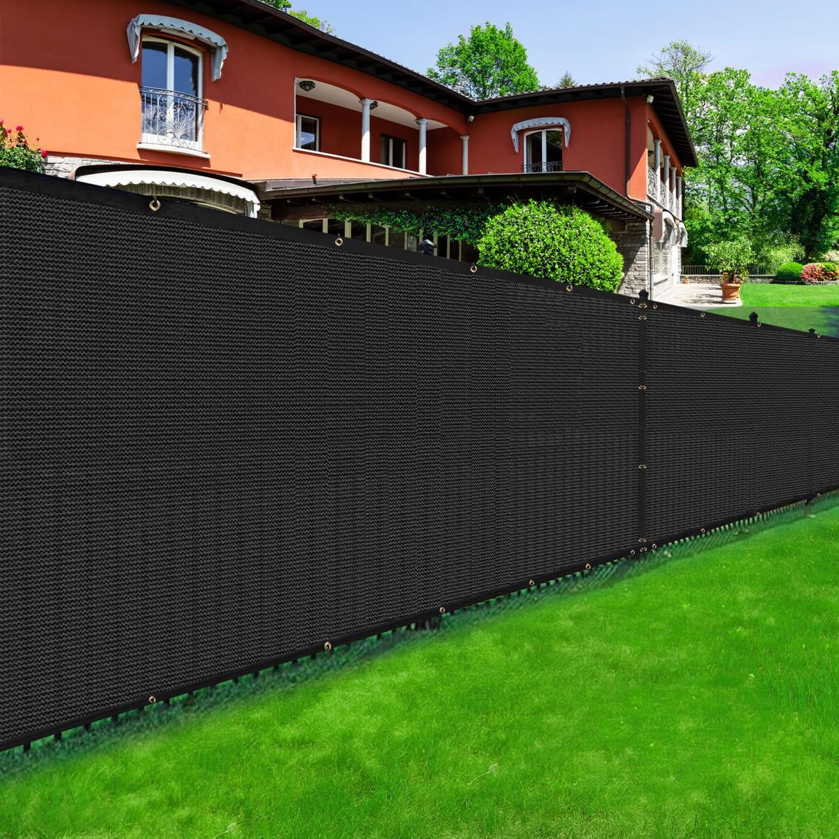 DenForste fence cover on a fence panel enhances privacy and reduces wind.