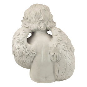 Design Toscano Angel dimpled cheeks closeup captures gentle mood.
