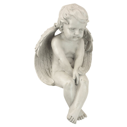Design Toscano Angel of Meditation statue on a shelf adds serene focal point.