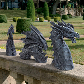 Design Toscano dragon measures 28 inches long and 14.5 inches high.