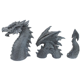 Design Toscano dragon on display evokes medieval ambiance in yard.