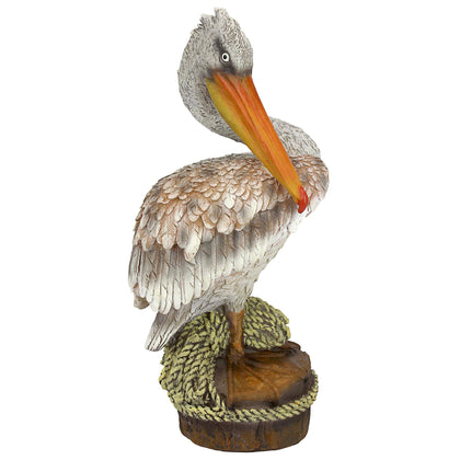 Design Toscano Ocean Side Pier 51 Pelican statue, front view with wood pilings and rope detail—ideal yard decor.