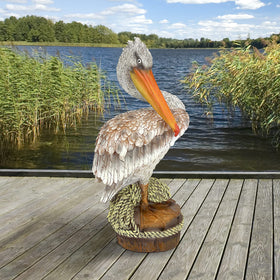 Design Toscano pelican statue, lightweight design enables easy repositioning.