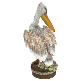 Design Toscano pelican statue, poolside placement option.
