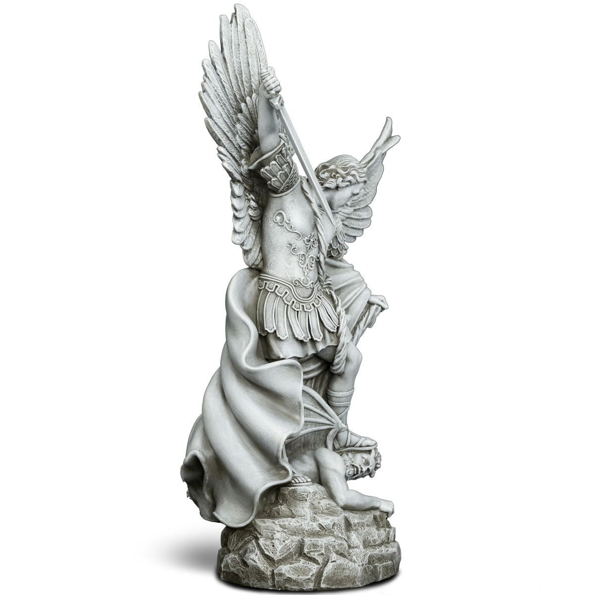 DevotedWalls Saint Michael indoors beside shelf or fireplace.